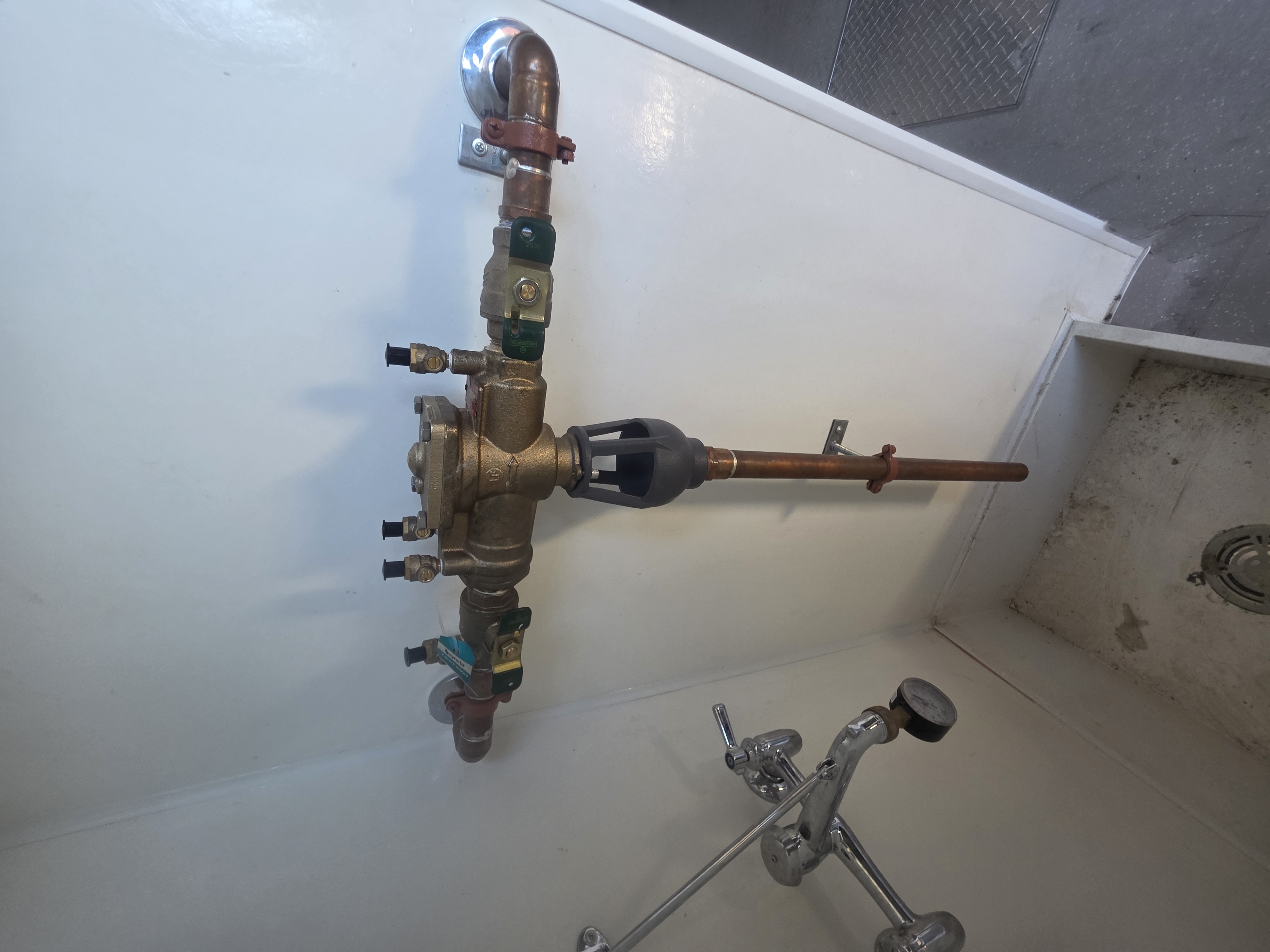 Laundry room plumbing installation with hot and cold supply lines by Browns Family Plumbing in Phoenix