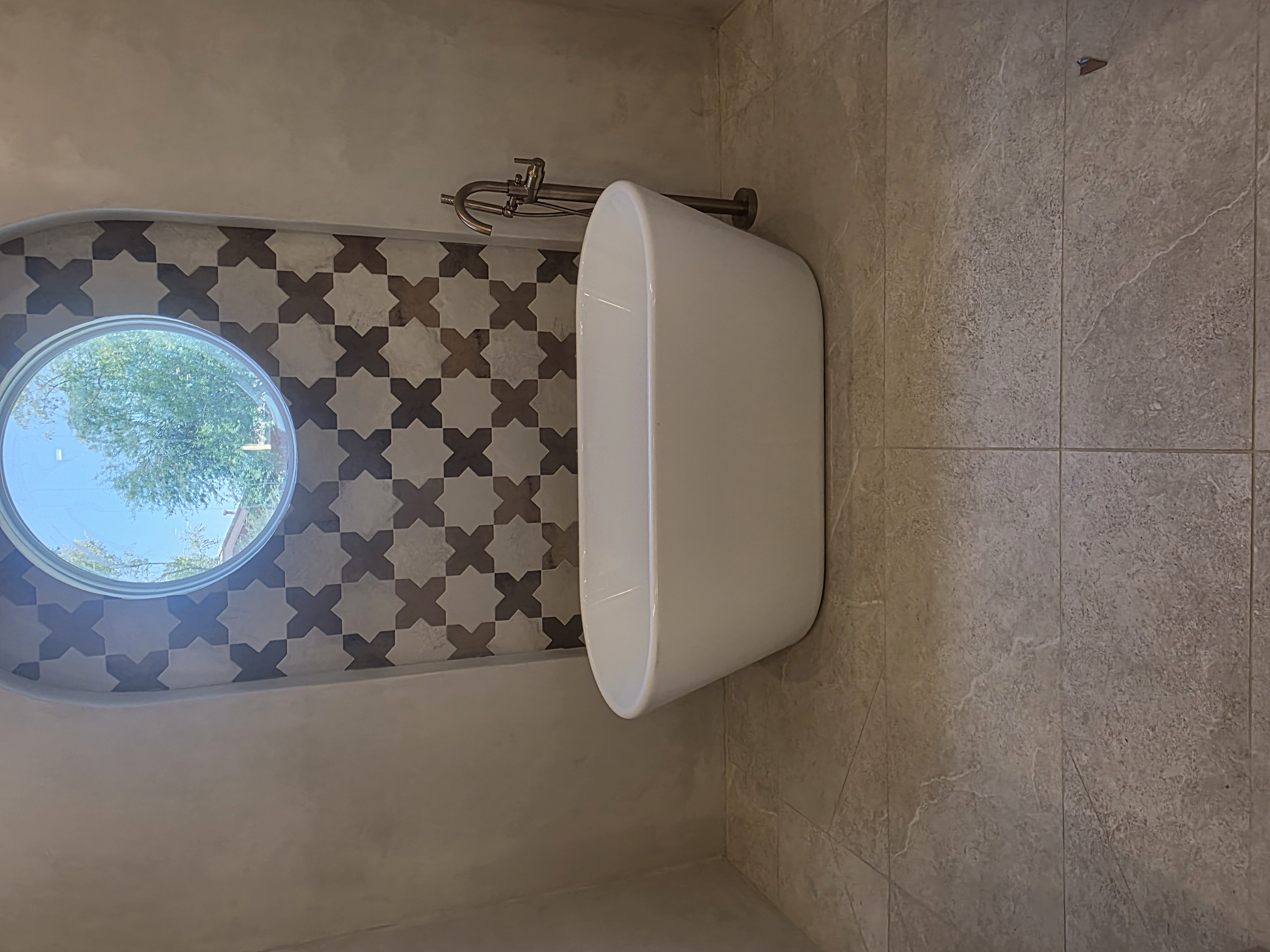 Freestanding bathtub and floor-mount faucet installation by Browns Family Plumbing in Phoenix, AZ
