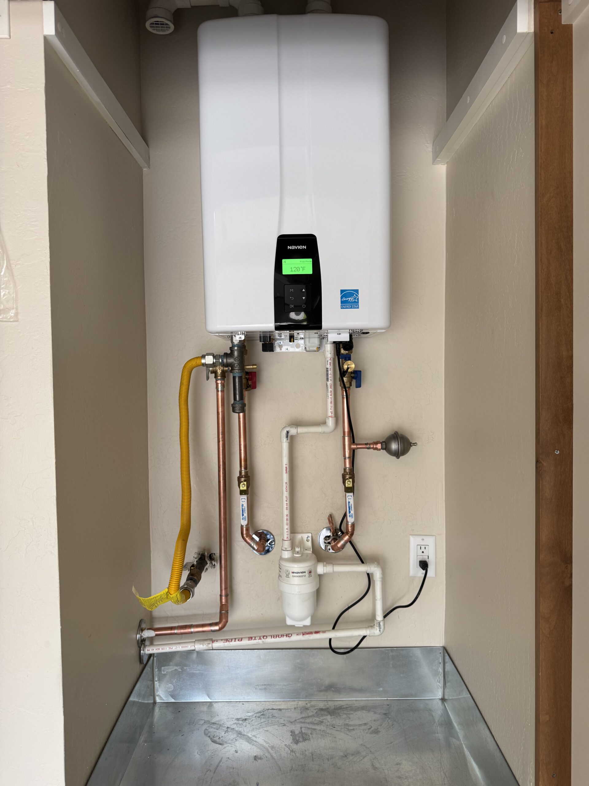 Water heater installation with copper pipe connections by Browns Family Plumbing, Phoenix, AZ