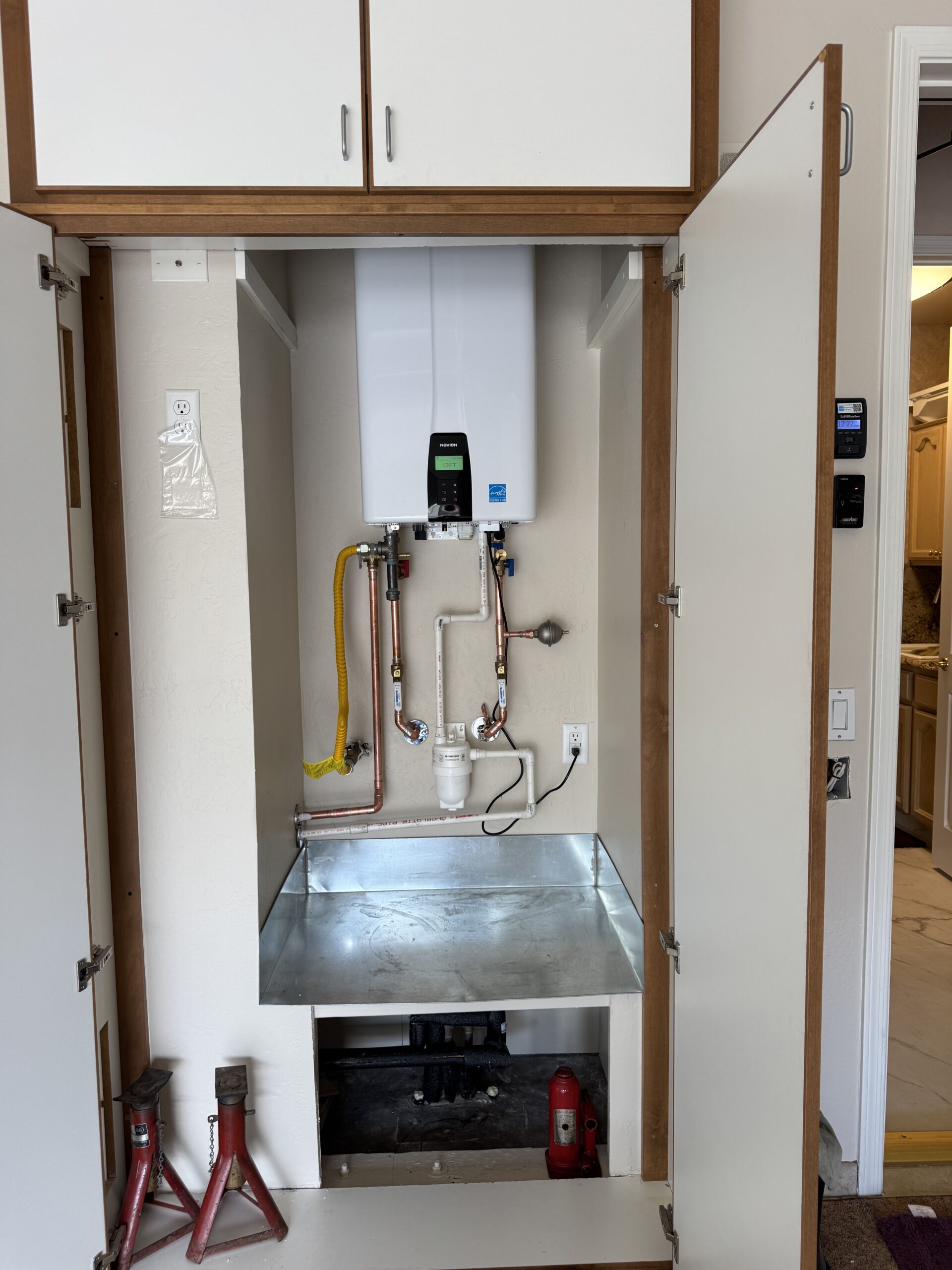 Tankless water heater installed by Browns Family Plumbing in a Phoenix, AZ home