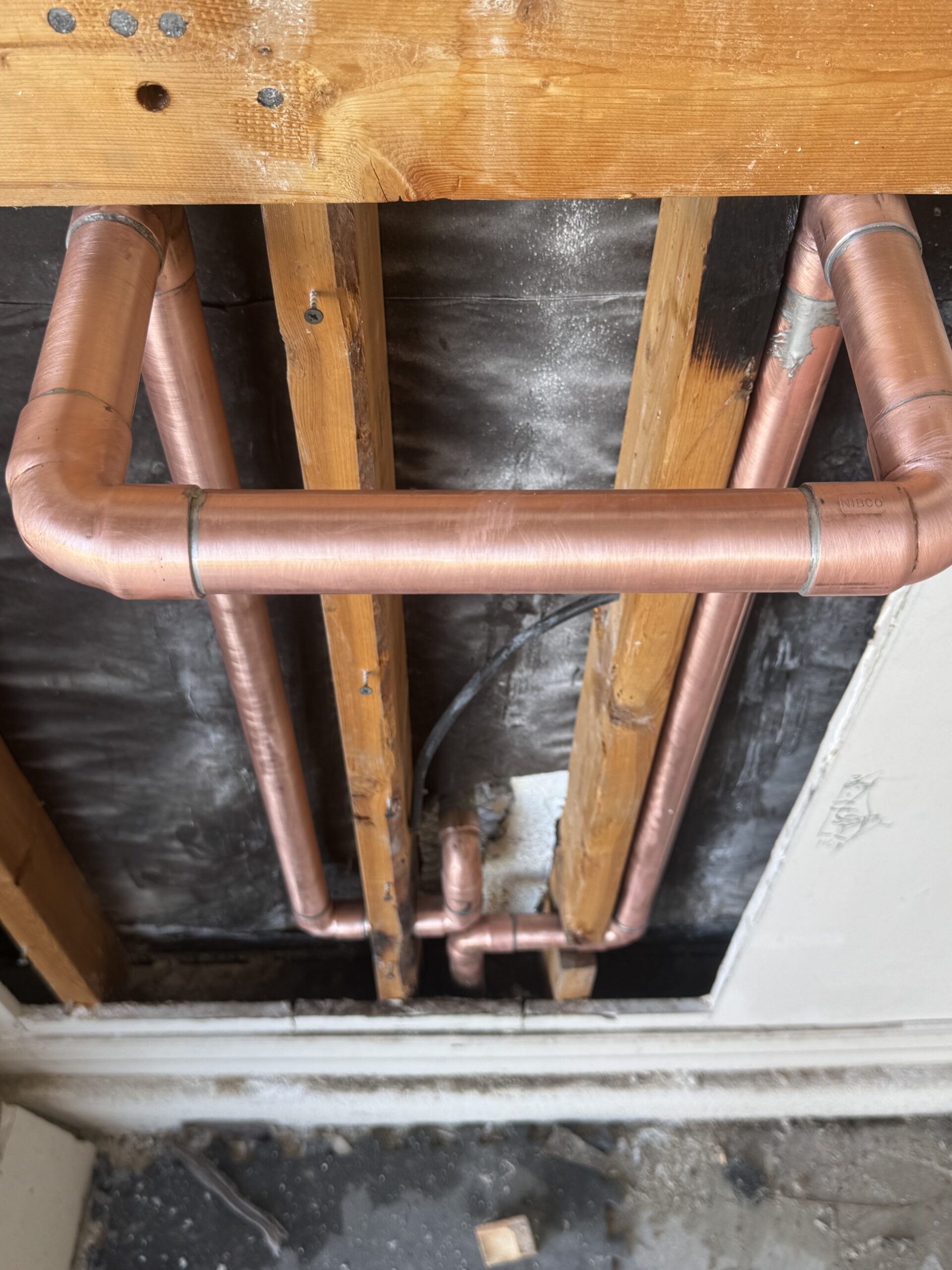 Residential water heater installation in garage by Browns Family Plumbing, Phoenix, AZ