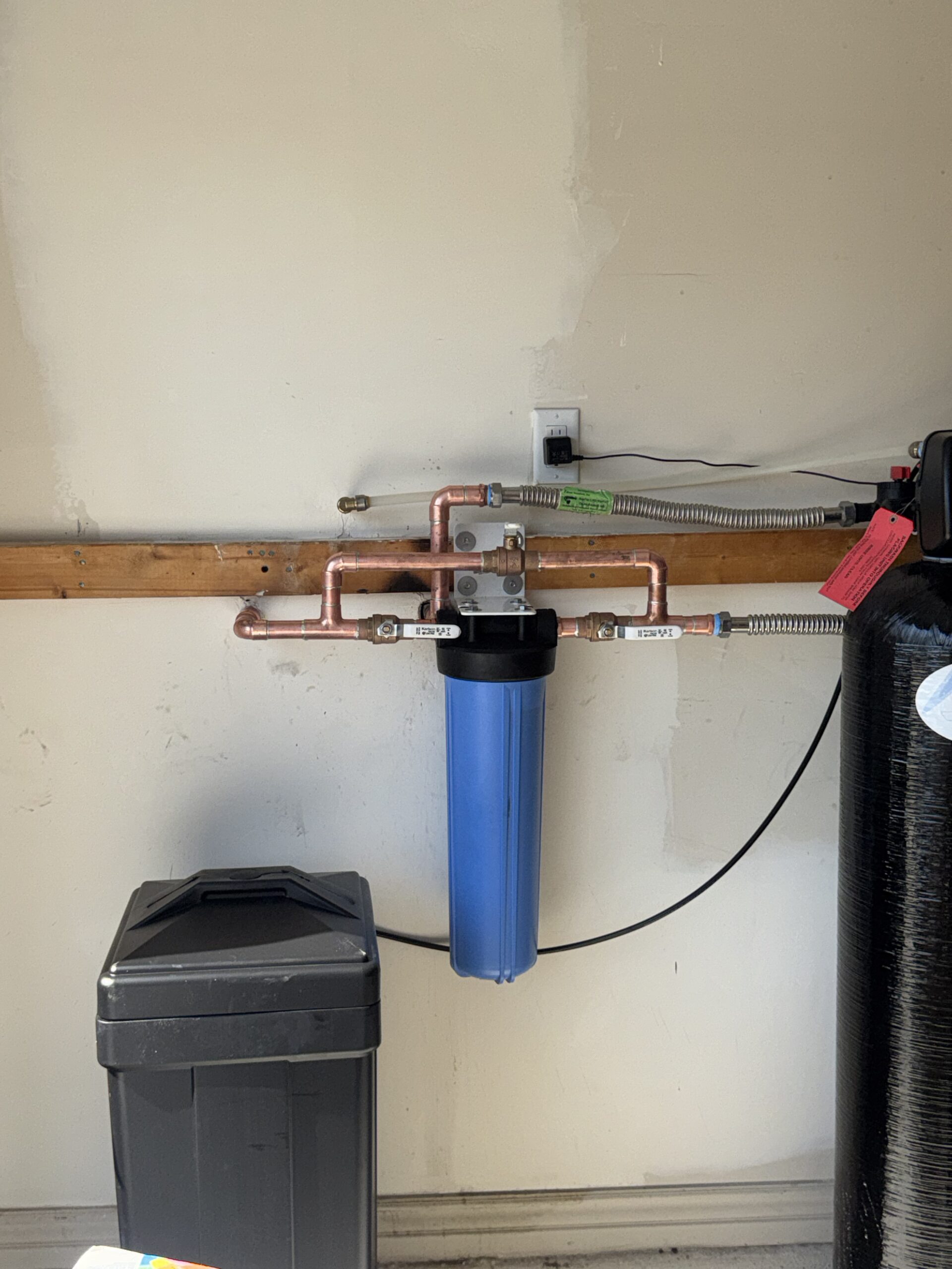 Reverse osmosis drinking water system installed under kitchen sink by Browns Family Plumbing in Phoenix